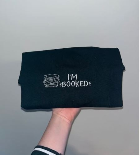 Booked shirt reading - im,